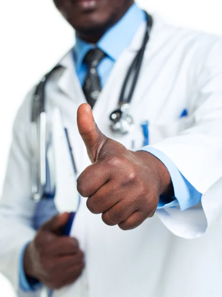 Portrait of a smiling male doctor holding a notepad and finger u — Stock Photo, Image