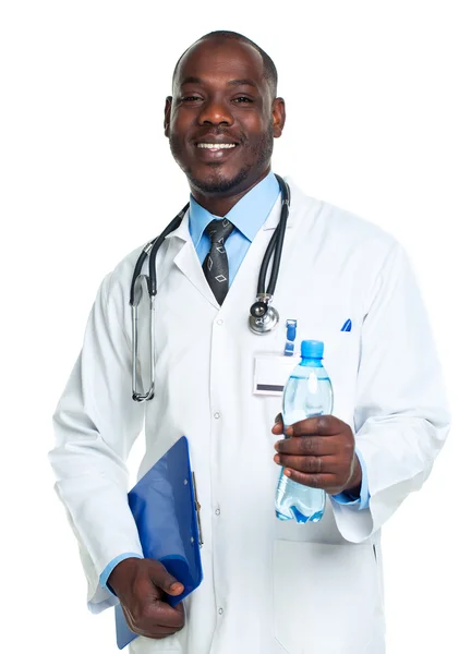 Portrait of a smiling male doctor holding bottle of water on whi — Stock Photo, Image