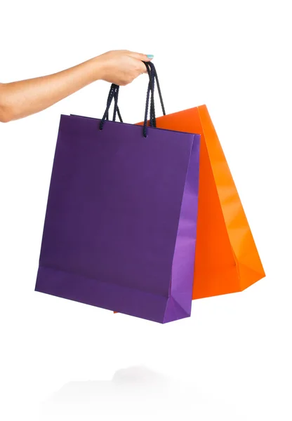 Two paper Shopping bags in woman hand — Stock Photo, Image