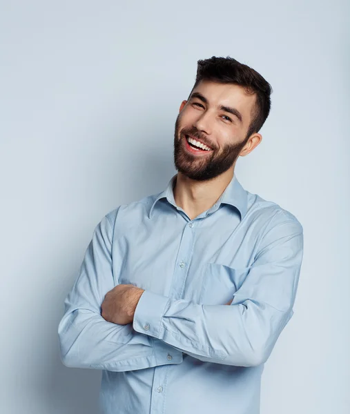 A young bearded man smiling — Stock Photo, Image