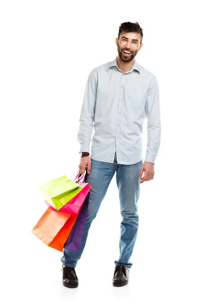 Mann mit Einkaufstüten. Weihnachts- und Feiertagskonzept — Stockfoto