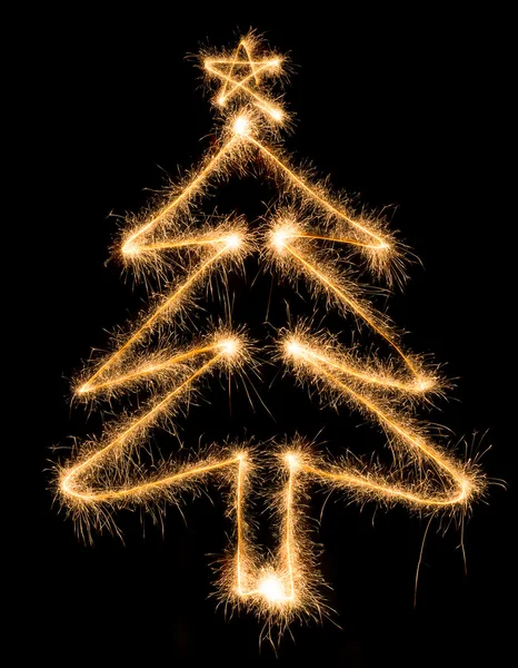 Christmas tree made by sparkler on a black — Stock Photo, Image