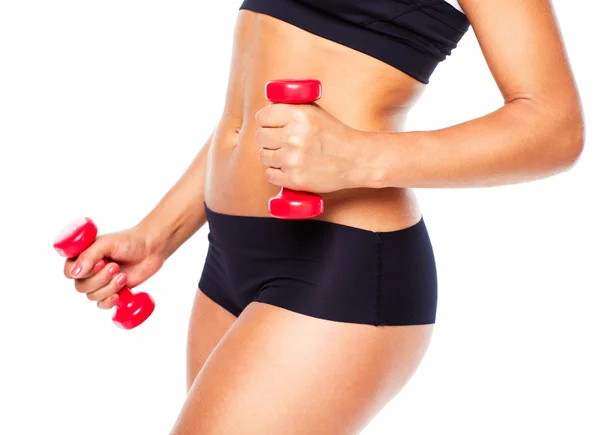 Beautiful slim woman with dumbbells, isolated on white — Stock Photo, Image