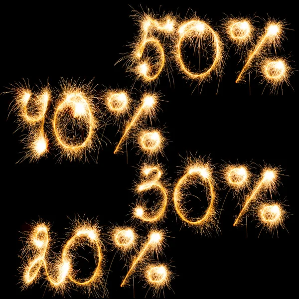 Sparkling inscripción de 50, 40, 30, 20 por ciento en un negro — Foto de Stock