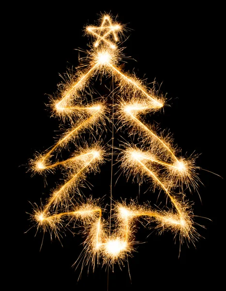 Christmas tree made by sparkler on a black — Stock Photo, Image