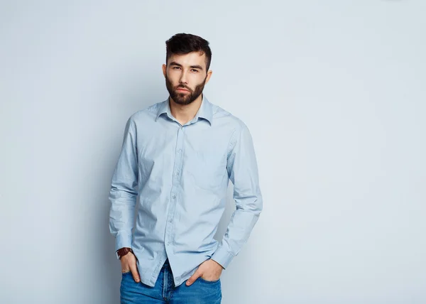 Bearded man with a serious expression on his face — Stock Photo, Image