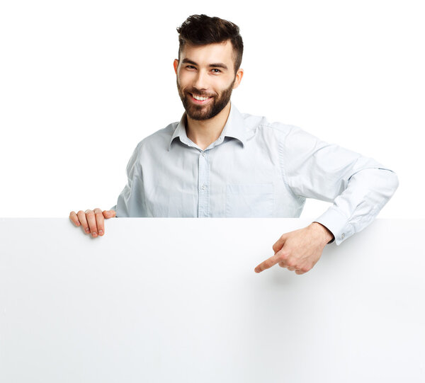 A young bearded man showing blank signboard, isolated over white