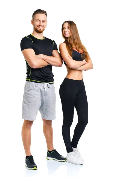 Atletische man en vrouw na fitness oefening op de witte — Stockfoto