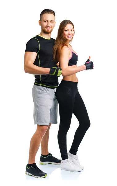 Athletic man and woman after fitness exercise with a finger up o — Stock Photo, Image