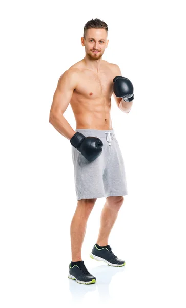 Athletic attractive man wearing boxing gloves on the white — Stock Photo, Image