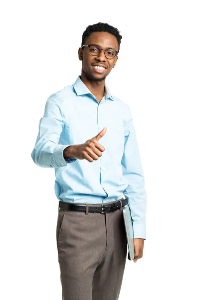Happy african american college student standing with laptop and — Stock Photo, Image