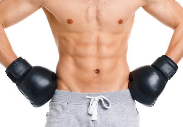 Hombre de deporte con guantes de boxeo en el blanco —  Fotos de Stock