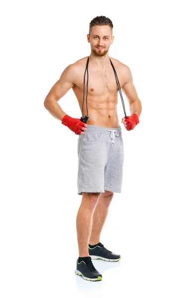 Athletic attractive man with a rope on the white — Stock Photo, Image