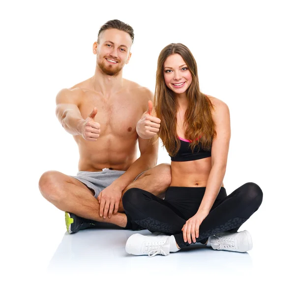 Sport Mann und Frau nach Fitnesstraining mit erhobenem Zeigefinger — Stockfoto