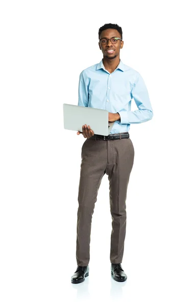 Happy african american college student with laptop standing on w — Stock Photo, Image
