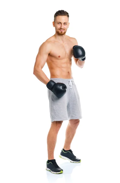 Спортивний привабливий чоловік в боксерських рукавичках на білому — стокове фото