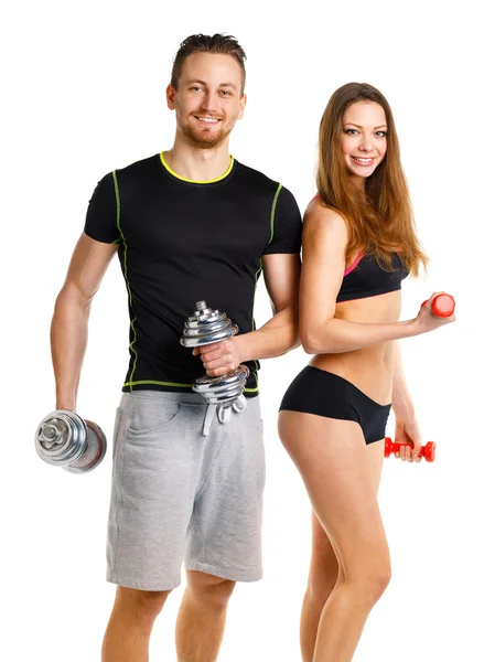 Sportpaar - Mann und Frau mit Kurzhanteln auf dem weißen — Stockfoto