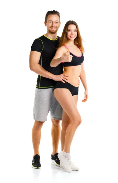 Sportlicher Mann und Frau nach Fitnessübung mit erhobenem Finger — Stockfoto