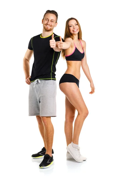 Sportlicher Mann und Frau nach Fitnessübung mit erhobenem Finger — Stockfoto