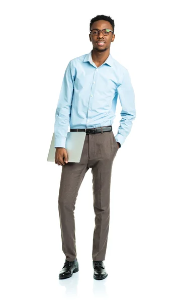Feliz estudiante afroamericano universitario con portátil de pie en blanco —  Fotos de Stock