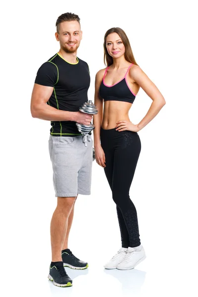 Sportpaar - Mann und Frau mit Kurzhanteln auf dem weißen — Stockfoto