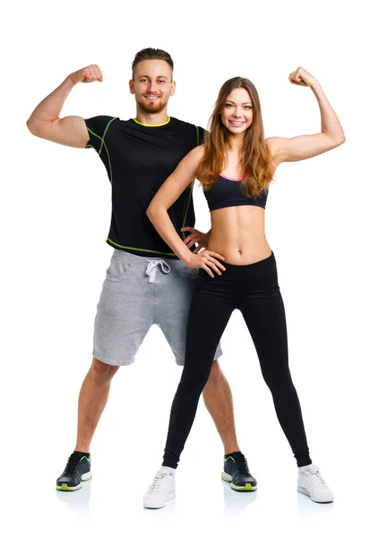 Hombre y mujer atléticos después del ejercicio físico en el blanco —  Fotos de Stock