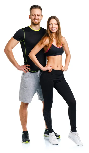 Αθλητισμός ζευγάρι - άνδρας και γυναίκα, μετά την άσκηση γυμναστήριο στο λευκό — Φωτογραφία Αρχείου