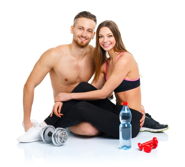 Pareja atlética - hombre y mujer después del ejercicio físico con mudo —  Fotos de Stock