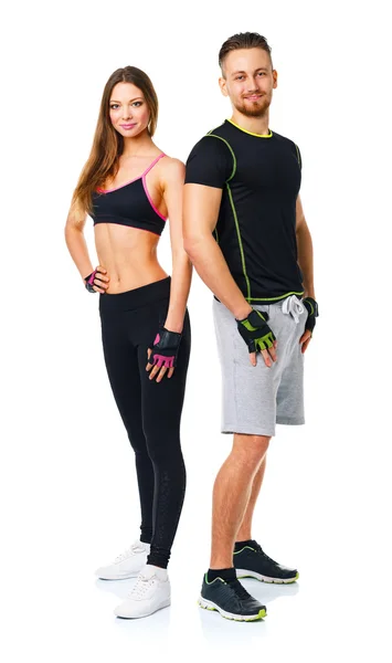 Sport couple - man and woman after fitness exercise on the white — Stock Photo, Image