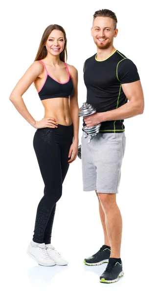 Athletischer Mann und Frau mit Hanteln auf dem weißen — Stockfoto