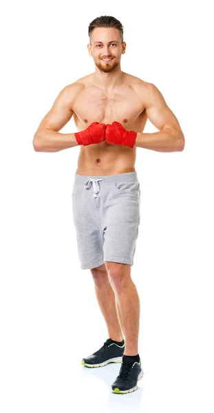 Athletic attraktiv man klädd i boxning bakgrund — Stockfoto