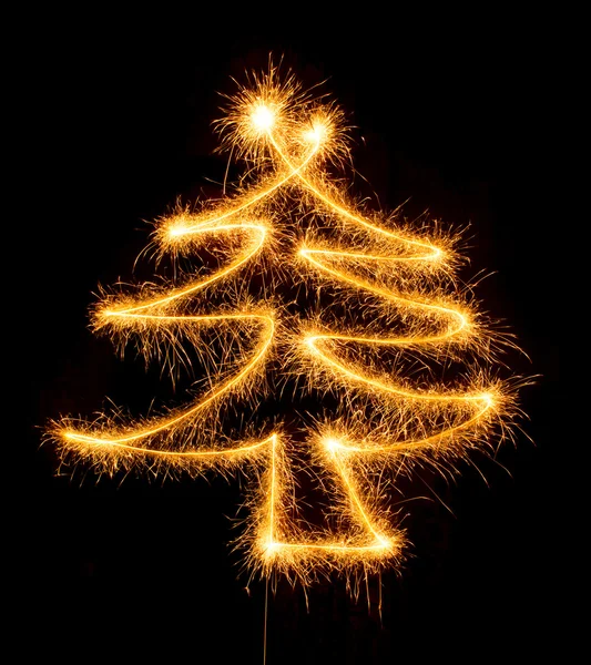 Christmas tree made by sparkler on a black — Stock Photo, Image