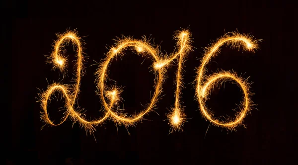 Happy New Year - 2016 met wonderkaarsen op zwart — Stockfoto