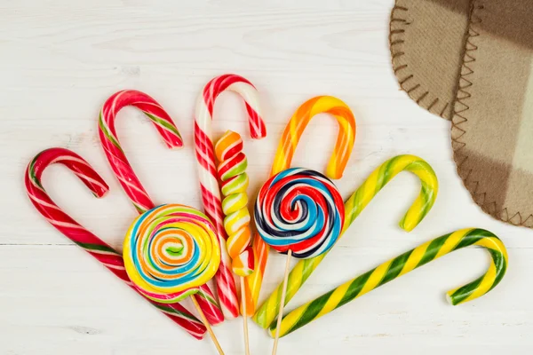 Colorful candy on wooden background — Stock Photo, Image