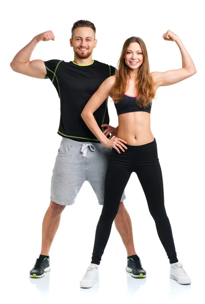 Athlétisme homme et femme après l'exercice de fitness sur le blanc — Photo