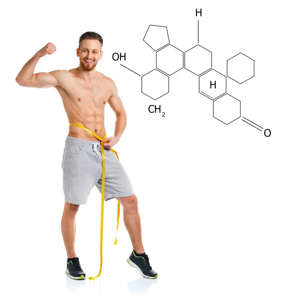 Athletic man with measuring tape with the chemical formula on ba — Stock Photo, Image