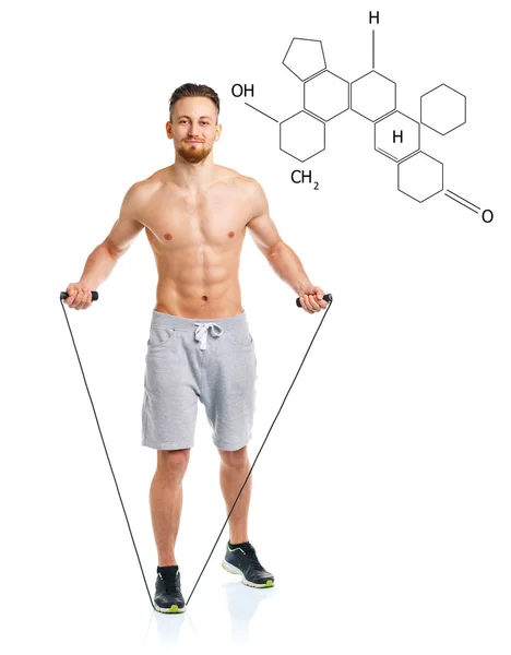 Kimyasal formülü ile bac üzerinde atlama atletik çekici adam — Stok fotoğraf