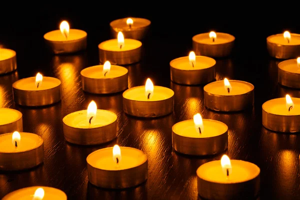 Many burning candles — Stock Photo, Image