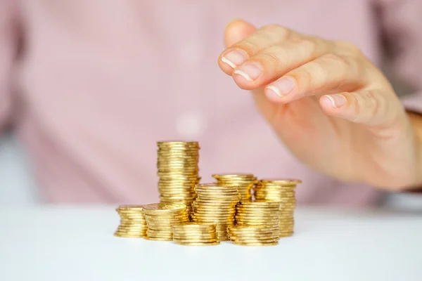 Protect new business start-up  - with hands and coin — Stock Photo, Image