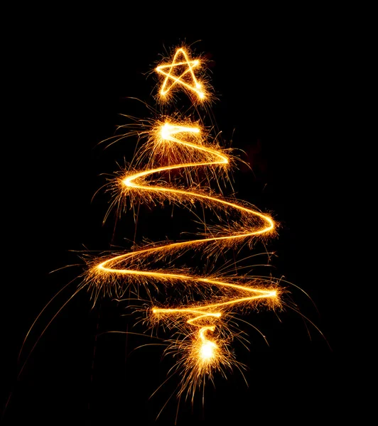 Christmas tree made with sparkler on a black — Stock Photo, Image