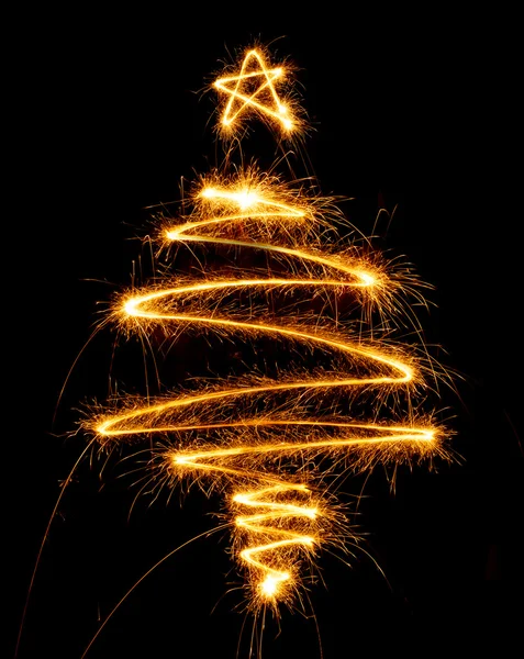 Christmas tree made with sparkler on a black — Stock Photo, Image