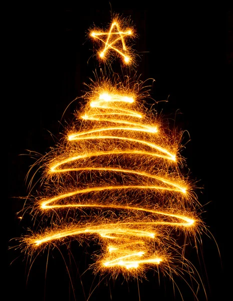 Christmas tree made with sparkler on a black — Stock Photo, Image