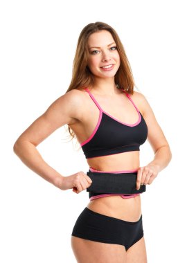 Beyaz izole spor egzersiz yaparak mutlu atletik kadın