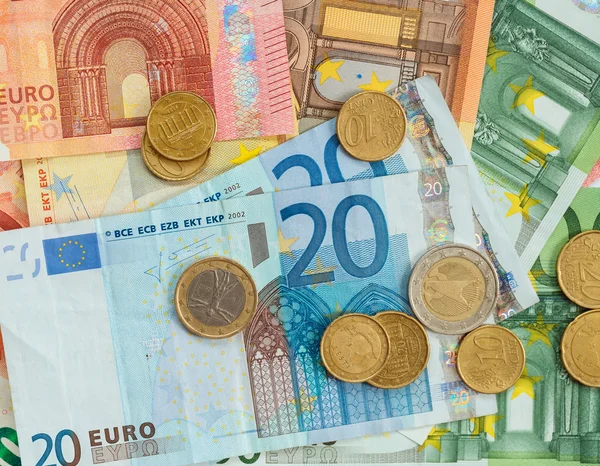 Monedas y billetes en euros — Foto de Stock