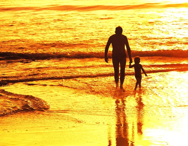 Father and little son silhouettes — Stock Photo, Image