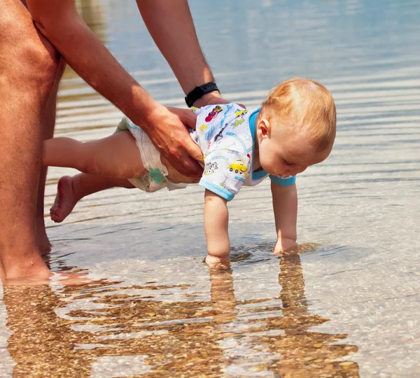 Far med baby - Stock-foto