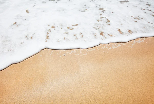 Sand und Wellen Hintergrund — Stockfoto