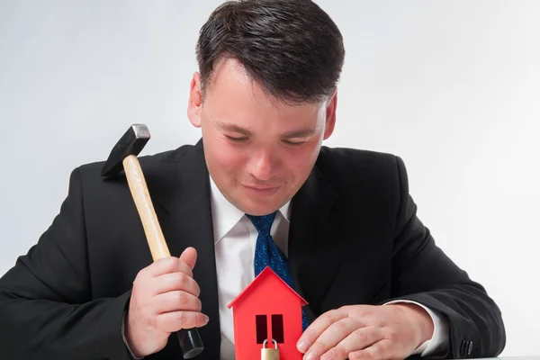 Businessman with hammer — Stock Photo, Image