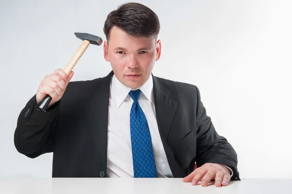 Businessman with hammer — Stock Photo, Image