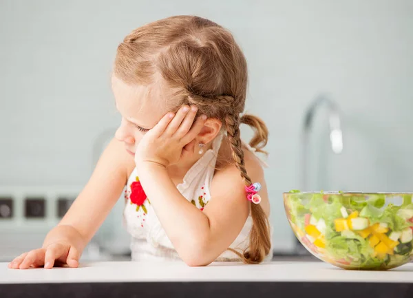 Little Girl Refuses Eat Salad Child Looks Disgust Food — Stock Photo, Image
